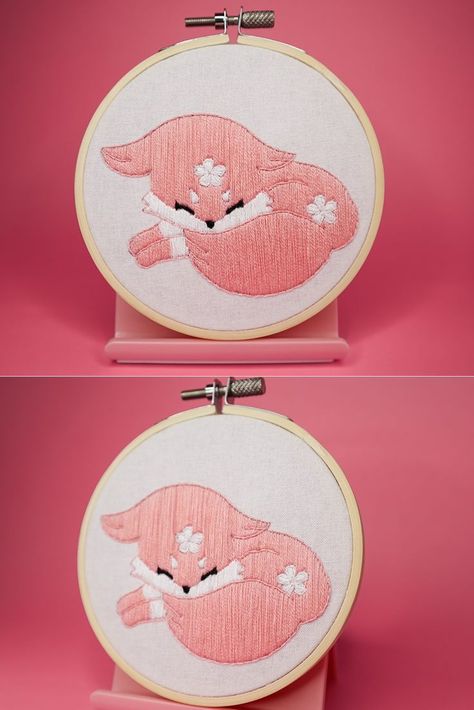 This is an embroidery of a Pink Fox inspired by Genshin Impact. It is curled up sleeping. It is hand stitched. It is in a 4 inch wooden hoop. Pokemon Stickers, Embroidery Wall, Embroidery Wall Art, Pink Fox, Fox Embroidery, Yae Miko, Wooden Hoop, Dmc Floss, Mail Letters