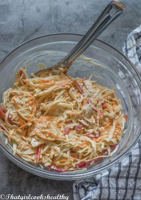 Jamaican Coleslaw in a glass bowl on a grey background. Jamaican Coleslaw, Dairy Free Lunch, Vegan Coleslaw, Cabbage Salad Recipes, Jamaican Dishes, Paleo Salads, Homemade Coleslaw, Creamy Dressing, Creamy Coleslaw