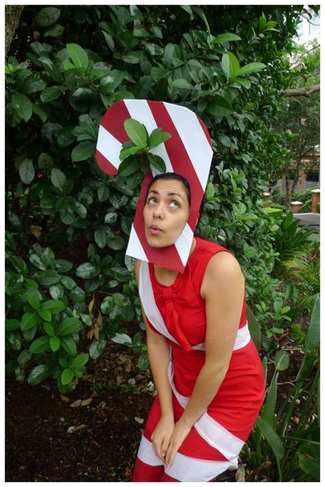 Day 173: Candy Cane christmas ornament #Christmas #costume #12daysofChristmas.Theme Me is a blog that follows a personal challenge to dress to a different theme every day for a whole year. Diy Candy Costume, Candy Cane Costume, Diy Candy Cane, Christmas Party Outfit Ideas, Candy Costume, Red Bow Dress, Kids Holiday Outfits, Christmas Fancy Dress, Candy Costumes