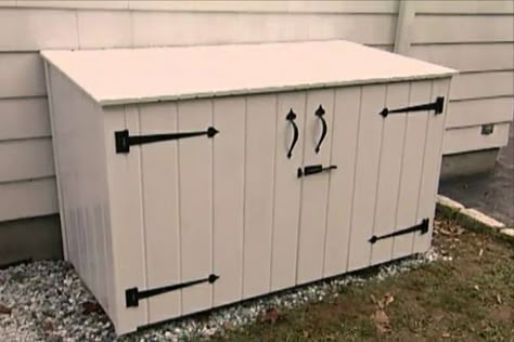 Learn how to construct an outside garbage enclosure that is attractive and animal-resistant.  <-- Going to make one that's smaller for our indoor garbage cans that are outside. :) Trash Box Outdoor, Garbage Container Storage Outdoor, Water Softner Storage, Diy Trash Enclosure, Diy Trash Can Storage Outdoor, Bear Proof Garbage Storage, Wood Garbage Bin Outdoor Storage, Lattice Garbage Can Enclosure Diy, Outdoor Trash Can Corral