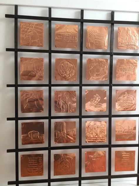 Every child traced and then carved on a 6 by 6 sheet of 5 mm copper square a monument from washington DC  The frame  make it complete great 4 grade auction class project Copper Sheet Metal Projects, Copper Sheets Projects, Copper Sheet Art, Aluminum Can Tile Art, Tin Foil Art Sculpture, Copper Engraving Art, Copper Sheet Artwork, Copper Diy Projects, Metal Embossing Art