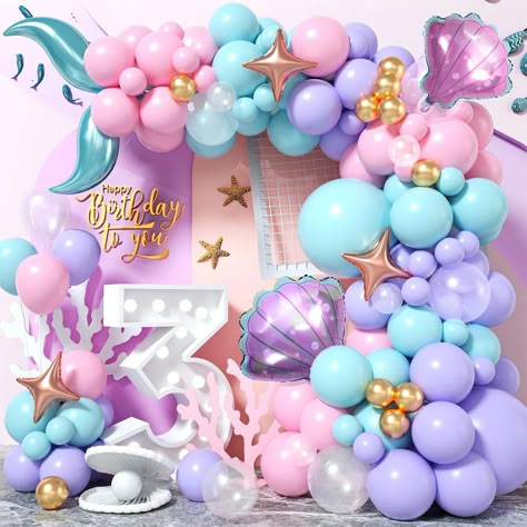 PRICES MAY VARY. 🌟 104 Pcs Mermaid Balloon Garland Arch Kit - You will get 104pcs party balloons, include teal blue balloons (1 x 18", 8 x 12", 10 x 10", 6 x 5"), pastel pink balloons (8 x 12", 10 x 10", 6 x 5"), macaron purple balloons(1 x 18", 8 x 12", 10 x 10", 6 x 5"), metallic gold balloons (8 x 5"), transparent balloons (2 x 12", 3 x 10", 3 x 5"), 2 x 18" mermaid tail balloons, 2 x shell foil balloons, 3 x 10" rose gold star balloons, 40pcs glue dot, 5m balloon chain(1 roll). 🌟 Non-toxic Ocean Theme Birthday, Mermaid Balloons, Fest Temaer, Transparent Balloons, Mermaid Party Decorations, Balloon Chain, Mermaid Theme Party, 10th Birthday Parties, Decoration Birthday