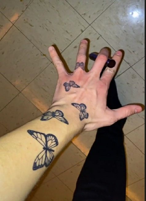 Butterfly Hand Tattoo Men, Butterflies Hand Tattoo, Men’s Wrist Tattoos, Wrist Tattoo Men, Wrist Tattoos Men, Small Hand Tattoos For Guys, Finger Tattoos Fade, Butterfly Sleeve Tattoo, Mens Butterfly Tattoo