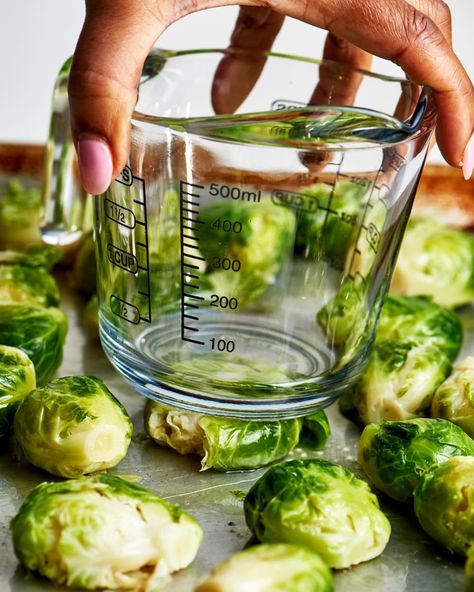 brussels sprouts being smashed with a measuring cup Brussel Sprout Recipes, Smashed Brussels Sprouts, Cabbage Roll, Studying Food, Plant Based Whole Foods, Sprout Recipes, Brussels Sprouts Recipe, Smashed Potatoes, Gluten Free Dinner