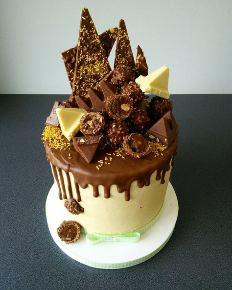 Milk chocolate drip cake, Toblerone and Ferrero Rocher Toblerone Cake Design, Toblerone Birthday Cake, Toblerone Cake, 60th Cake, Duper Cake, 40th Cake, Terry's Chocolate Orange, Chocolate Cake Designs, Dad Birthday Cakes