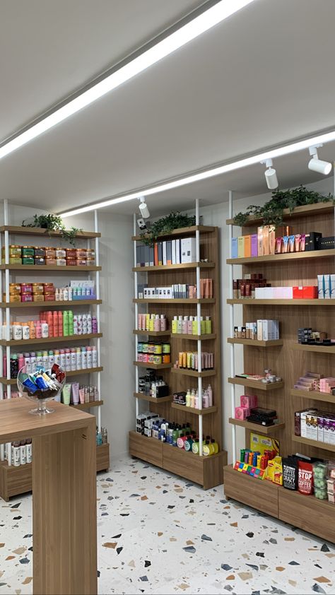 Cosmetic shop interior design Cosmetic Decoration Ideas, Cosmetic Store Design Ideas, Small Beauty Supply Store Design, Cosmetic Shelf Design, Cosmetic Shop Design Ideas, Makeup Shop Design Interior, Cosmetic Store Design Interiors, Designer Store Aesthetic, Hair Shop Ideas Interior Design