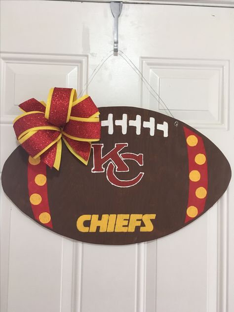 Kansas City Chiefs football door hanger. Kansas City Chiefs Sign Diy, Kc Chiefs Wood Signs, Kc Chiefs Party Decorations, Diy Chiefs Decor, Diy Kansas City Chiefs Decor, Kansas City Chiefs Decor, Kansas City Chiefs Wreath, Kc Chiefs Party, Chiefs Door Hanger