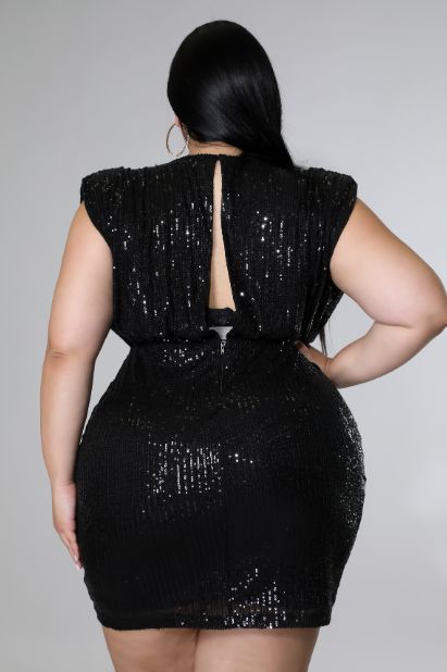 Try our new Plus Size Sparkle Dream Bodycon Dress! This figure-hugging dress is made from a shimmery and sparkly fabric that is sure to turn heads, whether you're hitting the dance floor or just strolling down the street. The v-neck design is both flattering and sexy, while the short, tight silhouette will show off your curves in all the right ways. Whether you're dressing for a special occasion or just want to feel like a glam goddess, this is the dress for you! Measurement Guide SIZE (INCHES) Tight Black Dress, Black Sequin Mini Dress, Sequin Midi Dress, Club Wear, Backless Mini Dress, Wholesale Dress, Sleeveless Sheath Dress, Women Party, Star Dress