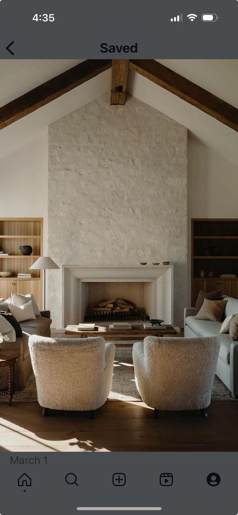 Creamy Stone Fireplace, Tumbled Stone Fireplace, Plaster Fireplace Over Brick, Plaster Over Rock Fireplace, Cannon Ball Fireplace, Stone Fireplace With Hearth And Mantle, Cozy Stone Fireplace, Spanish Style Fireplace Living Room, Large Fireplace Ideas