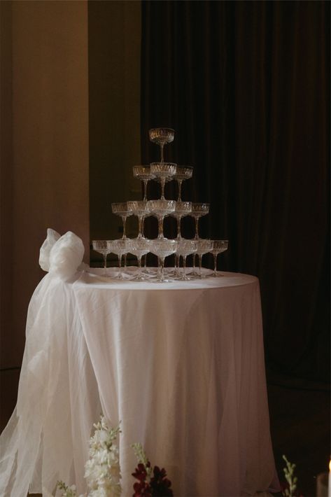 A champagne tower is the perfect way to add a touch of glamour to your wedding celebration! This stunning setup combines timeless elegance with modern sophistication, creating a memorable moment for your big day. Whether for the toast or a grand entrance, a champagne tower elevates any luxury wedding. Bar Inspiration, Champagne Tower, Destination Wedding Planner, Signature Drinks, Wedding Guide, Wedding Bar, Grand Entrance, Social Gathering, Stylish Wedding