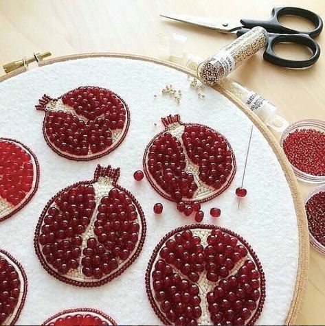 Could not love these juicy embroidered pomegranates from @brooch_garden more!  So simple but so poppy! I've never tried incorporating beading into my embroidery but I'm going to have to give this a go.   I love the contrasting burgundy and maroon.   #pomegranate #persephone #beadembroidery #handmadejewelry Crochet Brooch, Tambour Embroidery, Beads Embroidery, Bead Embroidery Patterns, Indian Embroidery, Hand Embroidery Art, Hand Embroidery Stitches, Modern Embroidery, Embroidery Hoop Art