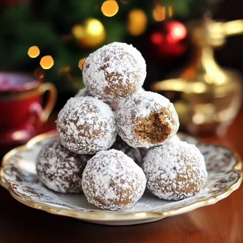 Welcome the holiday season with a delightful treat that combines the warm, spicy flavors of gingerbread with the buttery, melt-in-your-mouth texture of classic snowball cookies. These Easy Gingerbread Snowballs are Gingerbread Balls No Bake, Gingerbread Snowball Cookies, Snow Balls Cookies, Christmas Cookie Balls, Gingerbread Snowballs, Easy Xmas Cookies, Ginger Balls, Gingerbread Balls, Ginger Treats