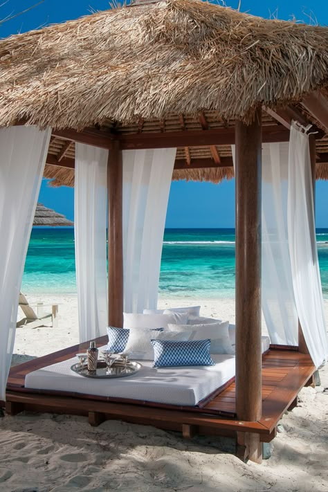 Our complimentary beach cabanas add that extra element of luxury to your beach days! So, relax in style at Sandals Royal Bahamian! | Luxury Travel | Couples Travel | Beach Cabanas | Romantic Vacation نباتات منزلية, Beach Cabana, Resort Design, Luxury Getaway, Romantic Vacations, Thatched Roof, Best Resorts, Beautiful Places To Travel, Travel Couple