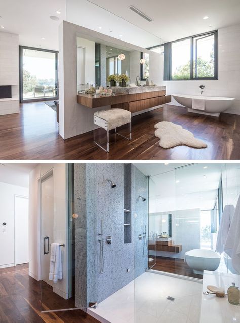 This master bathroom with dual showers and standalone bathtub, is tucked away behind a partition wall behind the bed. Standalone Bathtub, Tiered Seating, Architects Office, Open Dining Room, Modern Villa, Building Projects, Pacific Palisades, Loft Conversion, Partition Wall