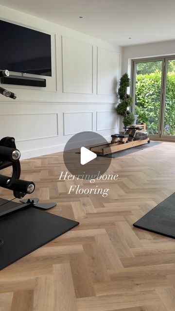 Beth Aspinall on Instagram: "Evening! Herringbone flooring… Sharing with you, our home gym flooring.  This is a luxury vinyl flooring by @invictuscarpetflooring. Its ultra strong coating, offers outstanding protection, which is exactly what we needed for this gym - yet gives the appearance of a real wood floor! The other advantage, is this won’t change colour, unlike real wood flooring that tends to orange over time. I’ve shared the name of this particular flooring, on the reel.  On another note, I keep thinking of having this room painted green? I think initially, I played it safe with white when this space was renovated, but now having lived with the space for more than a year, I’m thinking green will complement the warmth of the flooring a little more, than the white & also make the pan Vinyl Flooring Living Room, Herringbone Vinyl Floor, Have A Lovely Evening, Herringbone Flooring, Home Gym Flooring, Herringbone Wood Floor, Real Wood Floors, Floor Ideas, Green I