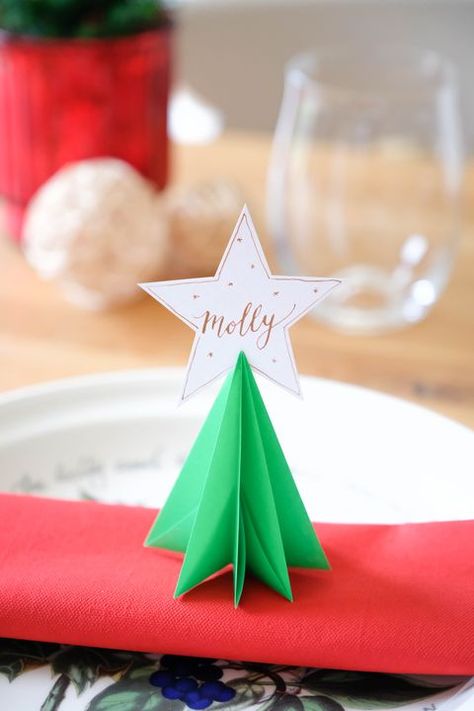 christmas table decorations - Origami Christmas tree place card Place Name Ideas Christmas, Diy Christmas Place Card Holders, Paper Christmas Table Decorations, Diy Christmas Place Cards, Christmas Place Card Ideas, Diy Christmas Place Settings, Christmas Table Name Cards Diy, Christmas Place Settings Diy, Hosting Activities