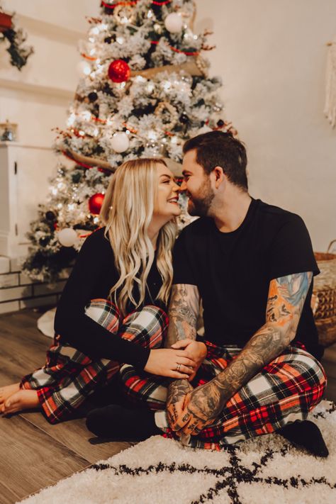 Christmas Pictures Ideas For Couples, Couple Photos Christmas Tree, Couple Christmas Pj Pictures, Pictures In Front Of Christmas Tree Couples, Couples Christmas Tree Pictures, Couples Christmas Pjs Photoshoot, Family Photo For Christmas, Christmas Pj Couple Pictures, Cute Couple Christmas Pajamas Pictures