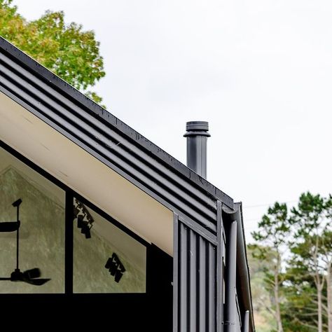 The Almost Eco Project on Instagram: "The exterior of our home is a mixture of @colorbondsteel and Shou Sugi Ban Charred hardwood. Our colorbond is in Monument with the matte finish. We absolutely adore matte finish. We even did our shed in the same product. We have no eaves on our northern side, which allows as much sun as possible to warm our concrete floors and keep the house comfortable in the cool Adelaide Hills winters. 📸 by @bookenblend" Booken Blend, Lisa Booth, Eco Project, Mid Century Modern Exterior, Eco Homes, We Shed, Sugi Ban, Shou Sugi Ban, Eco House