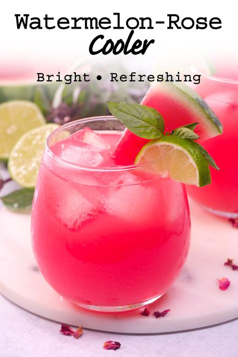 A refreshing fruity cocktail with subtle floral notes. Make this watermelon-rose cooler to help cool you off on a hot summer day. #watermeloncocktail #rosecocktail #watermeloncooler #homemadecocktail Watermelon Cooler Non Alcoholic, Mocktail Watermelon, Mocktails Non Alcoholic Watermelon, Watermelon Summer Drinks, Watermelon Cooler Cocktail, Rose Cocktail Recipes, Vegetarian Drinks, Simply Watermelon Cocktail, Watermelon Cocktail