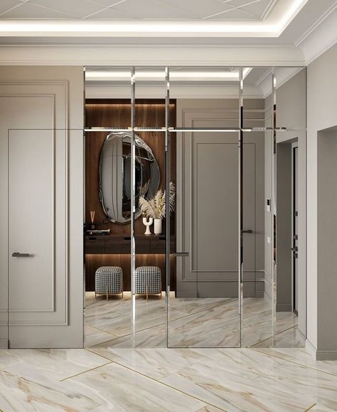 CLEVER CONCEALED STORAGE — LA CLOSET DESIGN Foyer Interior Design, Mirror Living Room Wall, Wall Mirror Living Room, Art Deco Style Interior, Mirror Decor Living Room, Mirror Wall Living Room, Mirror Design Wall, Home Entrance Decor, Commercial Interior Design