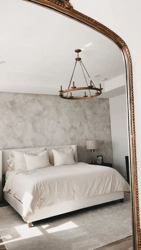 a delicate bedroom with grey limewashed walls, a creamy bed with matching bedding, black nightstands and neutral table lamps Limewash Colors, Delicate Bedroom, Limewashed Walls, Green Upholstered Bed, Black Nightstands, Home Interiors Ideas, Limewash Walls, Bedding Black, Old Jaffa