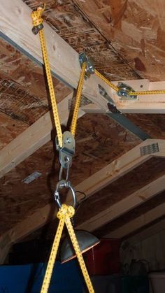 Rigging The Lifting Portion: Officine In Garage, Attic Lift, Diy Garage Storage Cabinets, Garage Door Makeover, Diy Garage Door, Diy Garage Shelves, Garage Work Bench, Diy Garage Storage, Garage Makeover