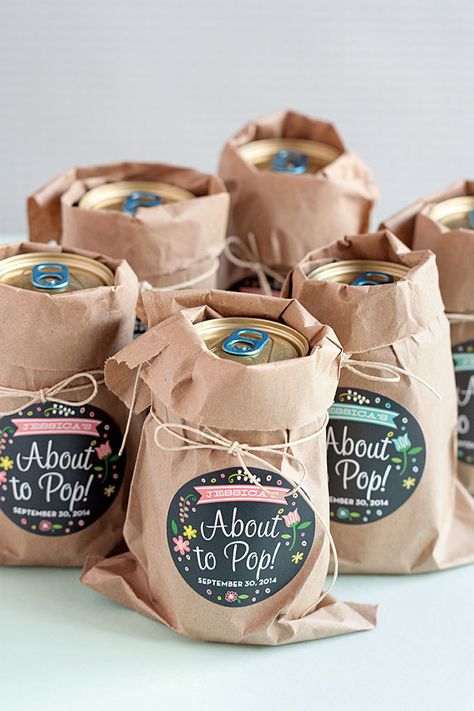 CafeMom.com : Custom Soda Pop Party Favor : 40 Adorable DIY Baby Shower Favors That Are Budget Friendly -- Give guests a can of soda pop to take home with a cute note attached so they can cheer to the happy news that the baby has arrived. Perlengkapan Bayi Diy, Bos Baby, About To Pop, Bebe Shower, Baby Shower Favors Diy, Babyshower Party, Boy Baby Shower Ideas, Baby Shower Labels, Baby Shower Bbq