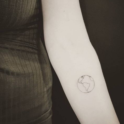 Fine line planet earth tattoo on the inner forearm. World Fine Line Tattoo, Small Earthy Tattoos, Astronomy Tattoos, Wanderlust Tattoos, Tattoo Planet, Planet Tattoo, Globe Tattoos, Earthy Tattoos, Earth Tattoo