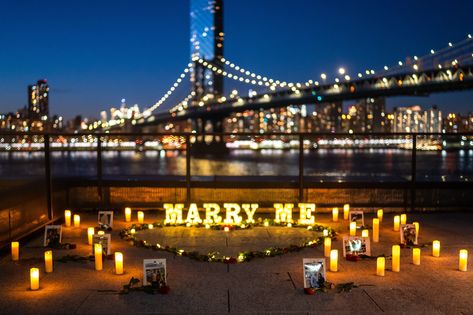 Candlelight proposal with the Brooklyn Bridge on the background | Proposal Ideas and Planning Candlelight Proposal, Bridge Proposal, Places In New York, Manhattan Skyline, Skyline View, Washington Street, Marriage Proposals, Pebble Beach, Proposal Ideas