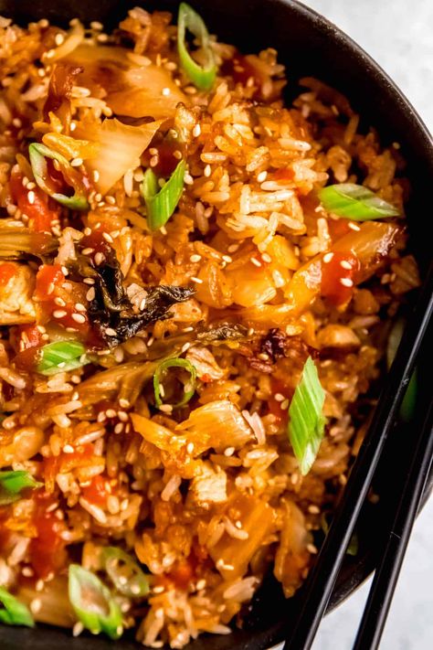 If you’re looking to transform your leftovers into a spectacular new weeknight meal, you’re going to love this Korean-inspired BBQ Pork Fried Rice with kimchi. Made with fewer than 10 ingredients and ready in under 40 minutes, this cheap and easy gochujang fried rice recipe has a perfect balance of spicy, bright flavors all wrapped up in a deliciously carb-y package. Meat isn’t cheap, so we stretch it where we can. This recipe feeds 4 with just a single pork chop! Bbq Pork Fried Rice, Vegetarian Kimchi, Pork Fried Rice Recipe, Breakfast Fried Rice, Steak Chili, Korean Pork, Bbq Pork Chops, Chili Garlic Paste, Leftover Steak