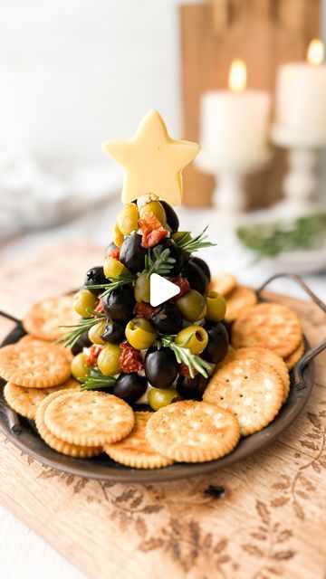 Kristel Talie on Instagram: "Cream cheese Christmas tree🎄

If you need a festive and fun appetizer, try this Christmas cheese ball, it’s super easy and looks so wonderful✨

Ingredients

300g black pepper Boursin (or any cream cheese you prefer)
Black olives
Green olives
Sun-dried tomatoes
Solid cheese to cut out the star (like Comté)
Ritz crackers for serving

Enjoy!✨

#creamcheese #christmasappetizers #boursincheese #christmastree #festiverecipes #recettenoel #recettefromage #christmasreels #foodphotography" Cheese Ball Christmas Tree, Cream Cheese Christmas Tree, Olive Christmas Tree, Boursin Cheese Appetizers, Christmas Hor D'oeuvres, Cheese Christmas Tree, Christmas Cheese Ball, Cheese Christmas, Christmas Food Crafts