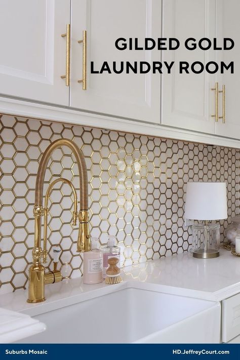 White laundry room sink and countertop with gold hardware showcasing the white marble hexagons with gold metal outlines mosaic on the wall. Glam Laundry Room, Top Loader Laundry Room, White And Gold Wallpaper, Laundry Room Tile, White Laundry Rooms, Home Setup, Laundry Room Lighting, Laundry Room Wallpaper, Gold Tile