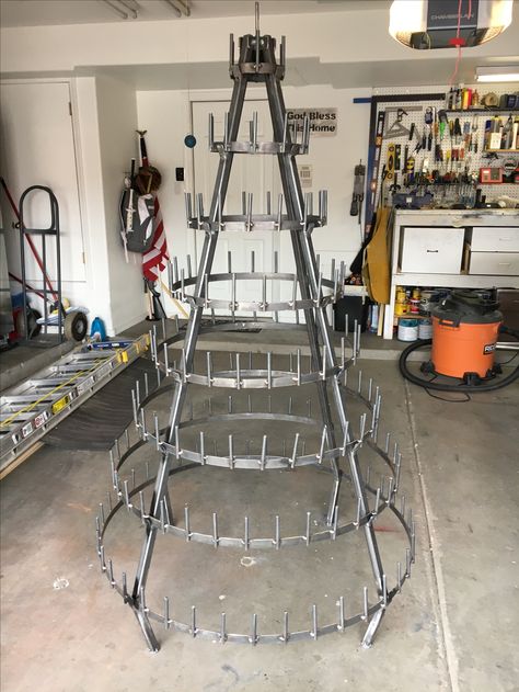 Welding is complete and it’s assembled now, without paint. Wine Bottle Christmas Tree Diy, Wine Tree Christmas, Wine Christmas Tree, Wine Bottle Christmas Tree, Bottle Christmas Tree, Wine Bottle Trees, Wine Bottle Project, Backyard Creations, Bottle Trees