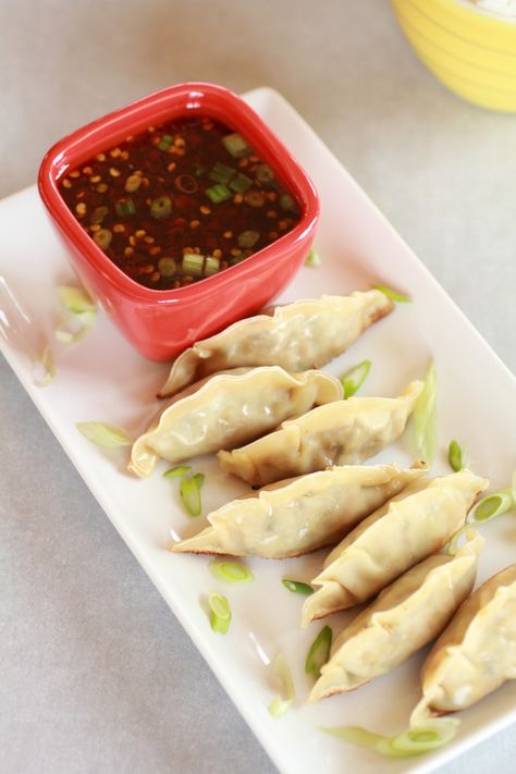 Vegetable potstickers with dumpling sauce recipe: Awesome We loved this recipe!! Would make it every day if it weren't so involved. Lots of chopping, lots of different vegetables to buy and prepare. Otherwise, so tasty and the sauce is phenomenal too. Will def make again! Vegetable Potstickers, Wontons, Dumpling Recipe, Half Baked Harvest, Snacks Für Party, Asian Dishes, Appetizer Snacks, Sauce Recipes, Dumplings