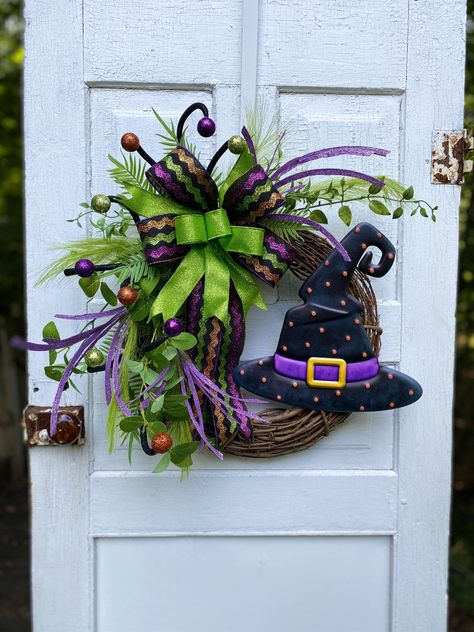 This cute and whimsical Halloween witch hat wreath will be a fun addition to your front door for all your Trick-or-Treater's! Mesh Witch Hat Wreath, Grapevine Halloween Wreath, Halloween Grapevine Wreath, Halloween Wreaths For Front Door, Halloween Cooking, Halloween Witch Hat Wreath, Witch Hat Wreath, Halloween Front Door Decorations, Fall Wreaths For Front Door