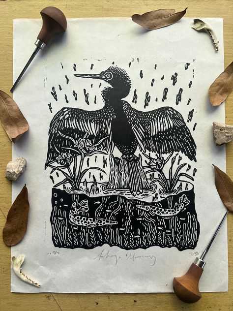 A hand-carved linoleum block print of the glorious Anhinga, sitting on a cypress stump with Florida Gar below. One of my favorite things to do is to spend the morning on the water, when the fog is just starting to lift and the Anhingas are out drying their wings. Such magic. The print is a celebration of the threatened and endangered species that live alongside us. I hope to bring attention to these species and remind us that it's our responsibility to ensure that these incredible creatures don't go extinct by our own hands.  Because each print is hand printed, there may be slight differences between the image shown here and the print that you receive. That's the beauty of prints though! Your print will be 100% unique, just as you are.  The image is approximately: 8x10 The paper size is ap Linoleum Print, Linoleum Block Printing, Hand Carved Stamps, Linoleum Block, Relief Printing, Linocut Art, Wood Block Printing, Incredible Creatures, Relief Print