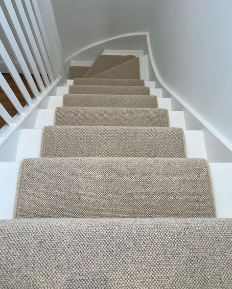 A white staircase with a wool carpet runner. The runner is a soft brown/beige. Loop Pile Carpet Bedroom, Loop Carpet Stairs, Wool Carpet Stair Runner, Wool Carpet Stairs, Stairs With Carpet Runner, Wool Loop Carpet, Carpet Stair Runner, Loop Pile Carpet, 1930s Semi