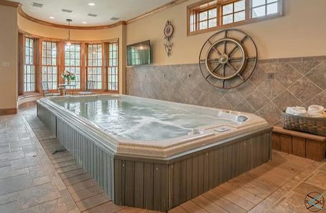 wood flooring around large rectangular hot tub in pool house Big Hot Tub, Hot Tub In Pool, Jacuzzi Tubs, Jacuzzi Room, Large Hot Tub, Home Spa Room, Indoor Hot Tub, Hot Tub Room, Tub Ideas