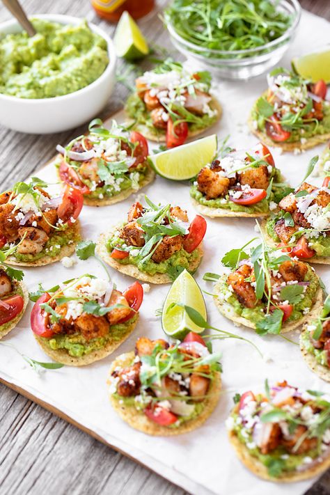 These shrimp tostada bites are topped with avocado, red onion, cherry tomatoes, cilantro, and Cotija cheese for lots of zesty flavor! | thecozyapron.com #shrimp #shrimptostadabites #shrimptostada #shrimpappetizers Shrimp Tostada, Canape Recipes, Shrimp Tostadas, Stomach Rumbling, 5 Course Meal, Tostada Recipes, Blackened Shrimp, Gourmet Appetizers, Steamed Mussels