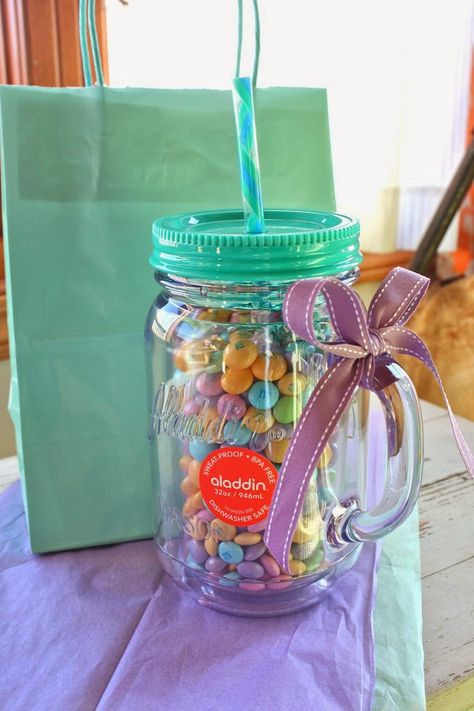 giant mason jar cup filled with pastel M & M's and a few truffles tucked in the top. Mason Jar Cup, Spring Gift Ideas, Mason Jar Cups, Personalised Gifts Diy, Diy Gift Baskets, Mason Jar Gifts, Mish Mash, Candy Bouquet, Spring Gifts