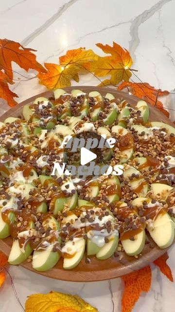 Linda | Make Life Extra | Fun Recipes + Home Finds + DIY on Instagram: "Apple nachos are the perfect dessert for all of your fall gatherings. 🍏🍎 Slice your apples. You can soak them in cold water with a tablespoon of salt to keep them from browning.  Arrange apple slices on a platter. Top with melted caramel, melted white chocolate, mini chocolate chips and nuts. The possibilities are endless so add your favorites. Enjoy!   #caramelapples #applenachos #appleseason #falldesserts #candyapples" Candy Apple Nachos, Fall Apple Nachos, Halloween Caramel Apple Slices, Caramel Dipped Apple Slices, Caramel Apple Platter, Apples And Caramel Dip Platter, Fall Charcuterie Board Dessert, Apple Slices Snack, October Dessert Ideas