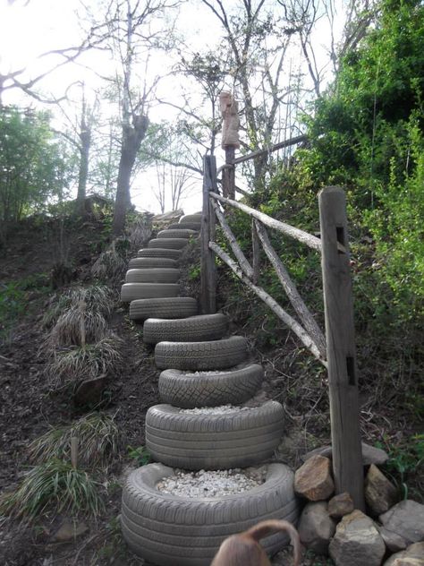 The tire steps leading to my garden.  I like the non-linear flow of the steps. Tire Steps Diy, Tire Landscaping Ideas, Tire Stairs, Dome Glamping, Tire Steps, Tire Garden, Diy Playground, Garden Stairs, Garden Ideas Cheap