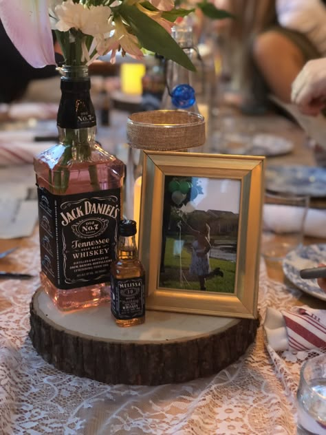 21st Birthday Table Centerpieces For Guys, 30 Birthday Centerpiece Ideas, Beer Mug Centerpiece For Men, Whisky Bottle Centerpiece, Whiskey Themed Centerpieces, Whiskey Party Centerpieces, Alcohol Centerpieces Parties, Hennessy Centerpieces, Whiskey Theme Party Decor