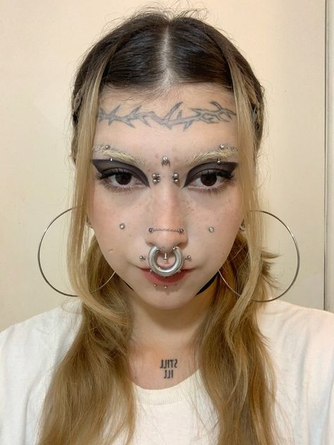 Lots Of Facial Piercings, Unique Tongue Piercing, Top And Bottom Lip Piercing, Stretched Nostril Piercing, Symmetrical Face Piercings, Septril Piercing Nose, Lots Of Face Piercings, Full Face Piercings, Big Septum Piercing