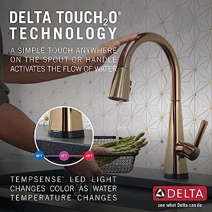 TOUCH ON. TOUCH OFF. Messy hands, Touch anywhere on the kitchen spout with your wrist or forearm to start and stop the flow of water or use the single lever handle manually. Check your water temperature from across the room using the TempSense LED indicator light that changes color to reflect water temperature LASTS 2X LONGER: Patented Diamond Seal Technology reduces leak points and lasts twice as long as the industry standard—ensuring leak-free operation for the life of the kitchen faucet Kitchen Faucets 2024, Touch Kitchen Faucet, Delta Kitchen Faucet, Gold Kitchen Faucet, Accessible Kitchen, Beach Kitchen, Cleaning Faucets, Kitchen Faucet With Sprayer, Beach Kitchens