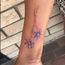 Aster Flower Tattoo, Tattoos For Childrens Names, Aster Tattoo, Small Daisy Tattoo, Aster Flower Tattoos, Daisy Tattoos, Name Flower Tattoo, Daisy Tattoo Designs, Cool Tattoos For Girls