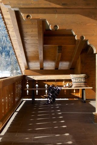 Tino Zervudachi's Gstaad chalet | House & Garden Chalet Balcony, Swiss Chalet Exterior, Swiss Decor, Norwegian Cottage, Chalet Exterior, French Window, Mountain Interiors, Barn Living, Balcony Lighting