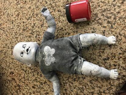 How To Make A Zombie Baby | Hometalk Zombie Dolls Diy Halloween Decorations, Diy Creepy Dolls Tutorials, Painting Dolls For Halloween, How To Make A Creepy Doll, Painting Creepy Dolls, Baby Doll Halloween Decorations, Zombie Baby Dolls Diy, Scary Dolls Diy, Zombie Dolls Diy