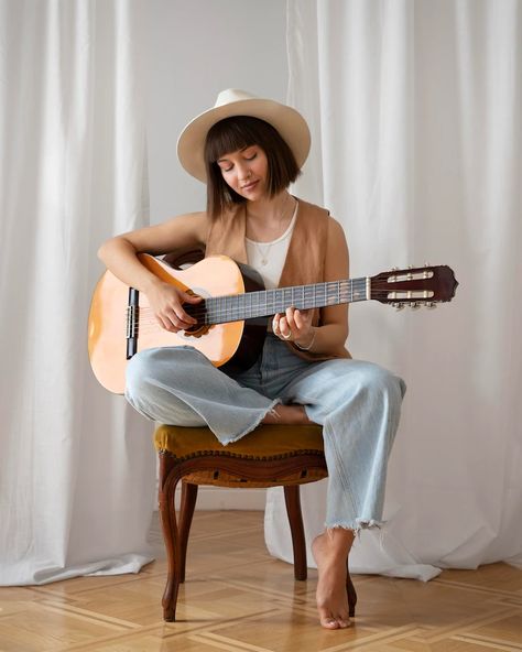 Sitting Down Playing Guitar Reference, Play Guitar Reference, Person With A Guitar Reference, Person Sitting Playing Guitar, Guitar Pose Reference Sitting, Sitting Guitar Pose, Women With Guitars, Pose Reference Photo Guitar, Playing Guitar Pose Reference Sitting