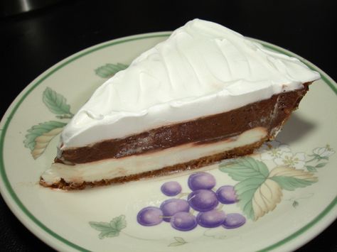 Mud Pie With Vanilla Wafer & Pecan Crust from Food.com: I use a food processor to put together the vanilla wafer/pecan crust -- the highlight of this pie! I will make this one again and again, it is so easy and delicious. (Cook time is refrigeration time.) This is a slight adaptation of a recipe from Kraft Food & Family magazine. Chocolate Haupia Pie Recipe, Chocolate Haupia Pie, Chocolate Haupia, Pecan Crust Recipe, Hawaii Desserts, Haupia Pie, Peanut Butter Cream Pie, Hawaiian Desserts, Pecan Crust